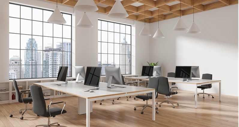Modern open-plan office with computer desks and chairs, wooden ceiling, large windows, city background, concept of contemporary workspace. 3D Rendering